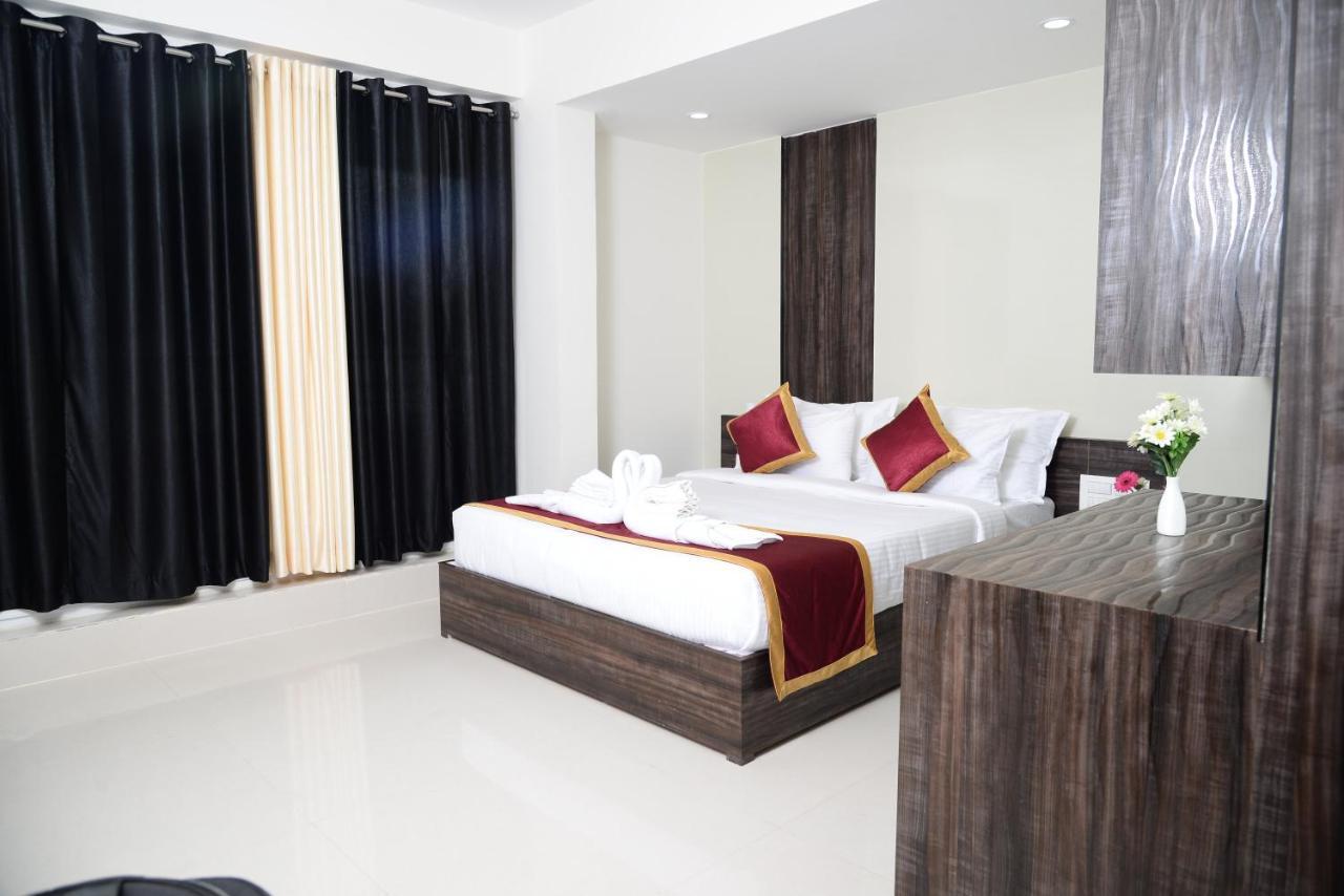 חסן Miles Inn Hotel מראה חיצוני תמונה